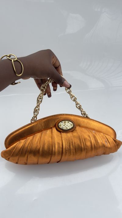 Metallic Orange Pleated Clutch